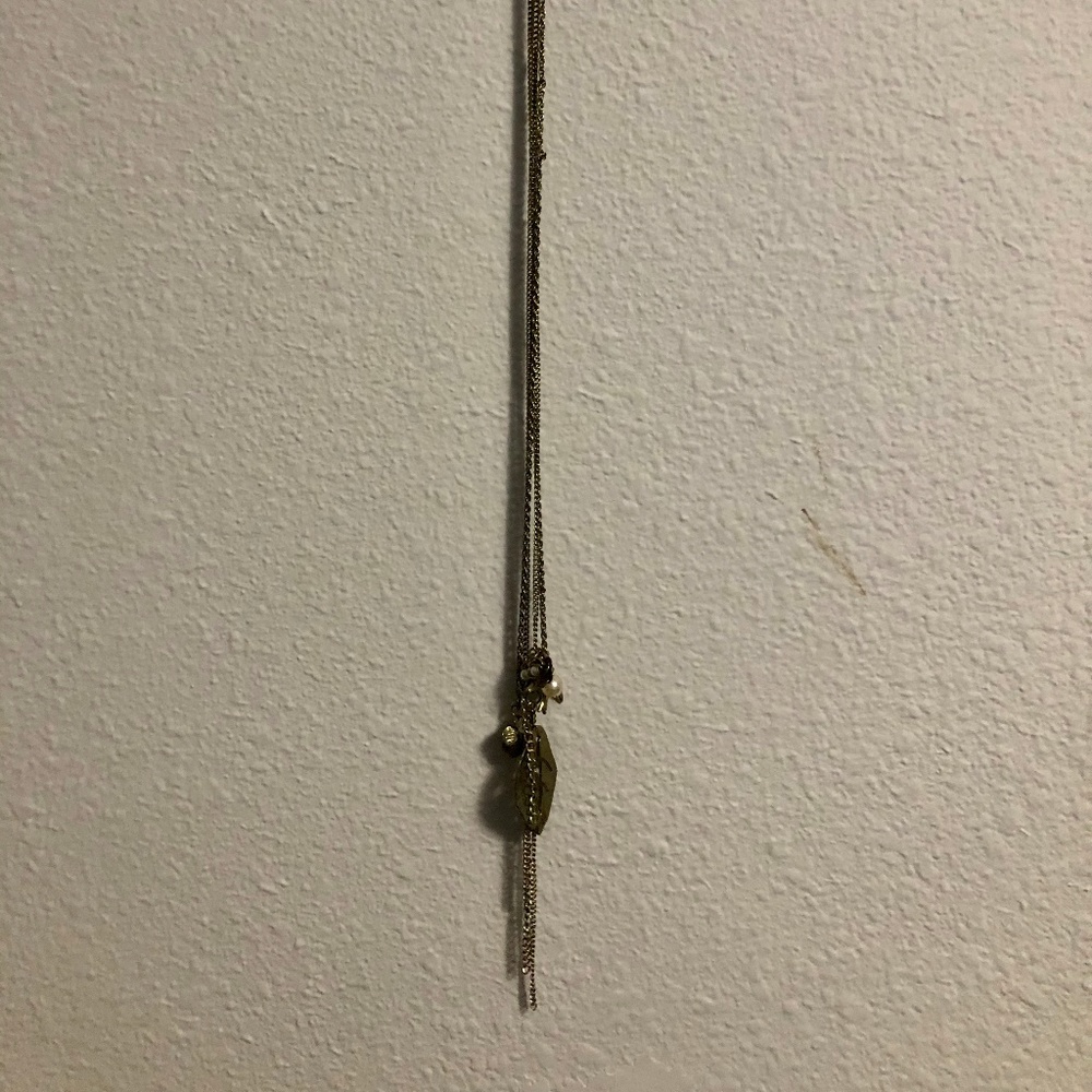 Necklace with leaf/bird/bead pendant